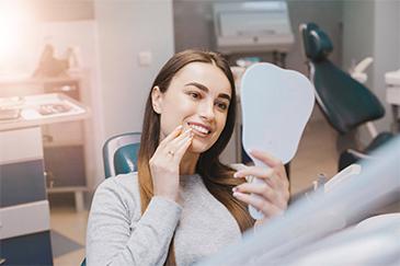 woman after dental cleaning in garran