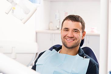 man at emergency dentist appointment in garran