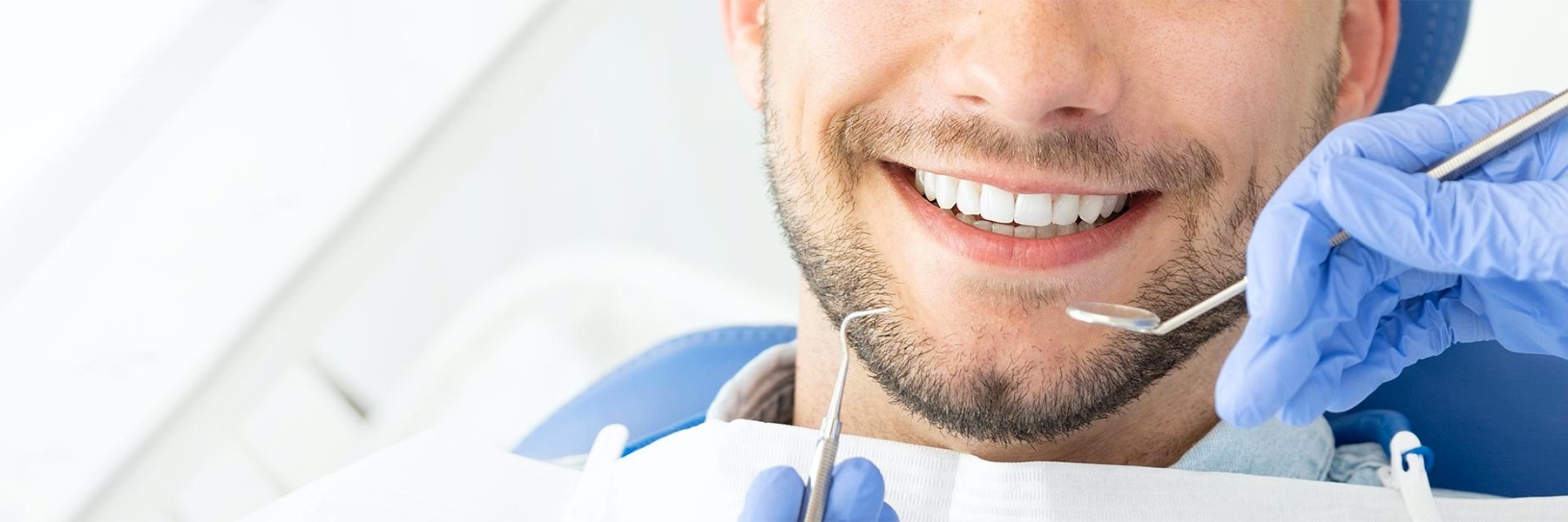 man with dental crowns in garran