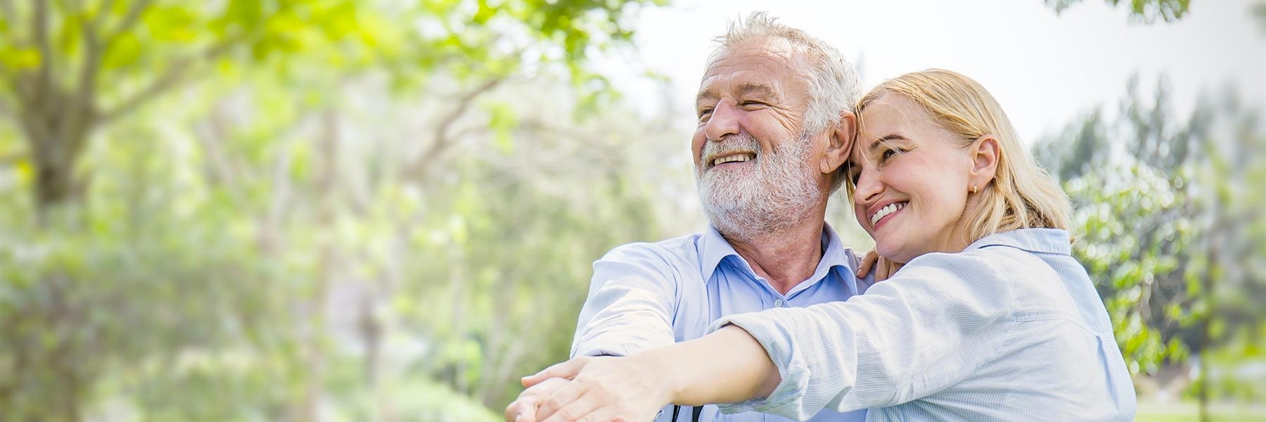 couple with dental implants in garran
